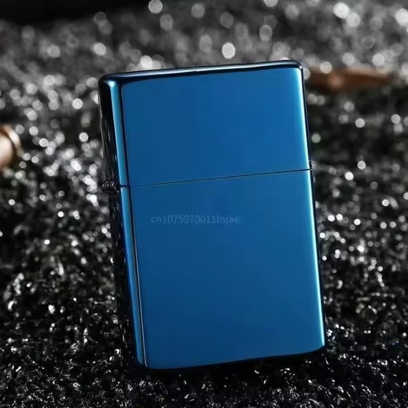 Blue metal flip lighter shown from the back