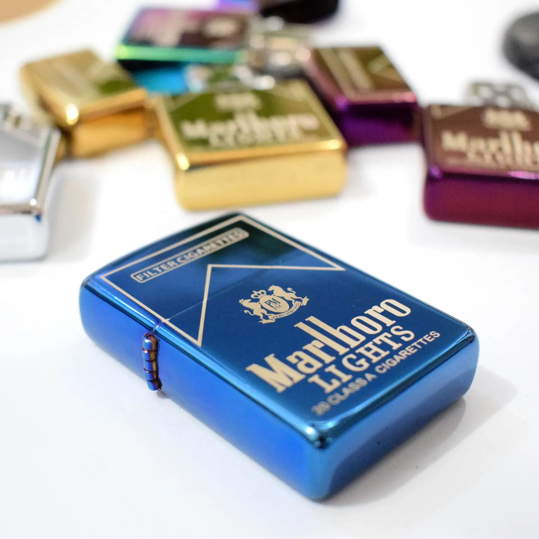 Metal flip lighter product collage showing multiple finishes