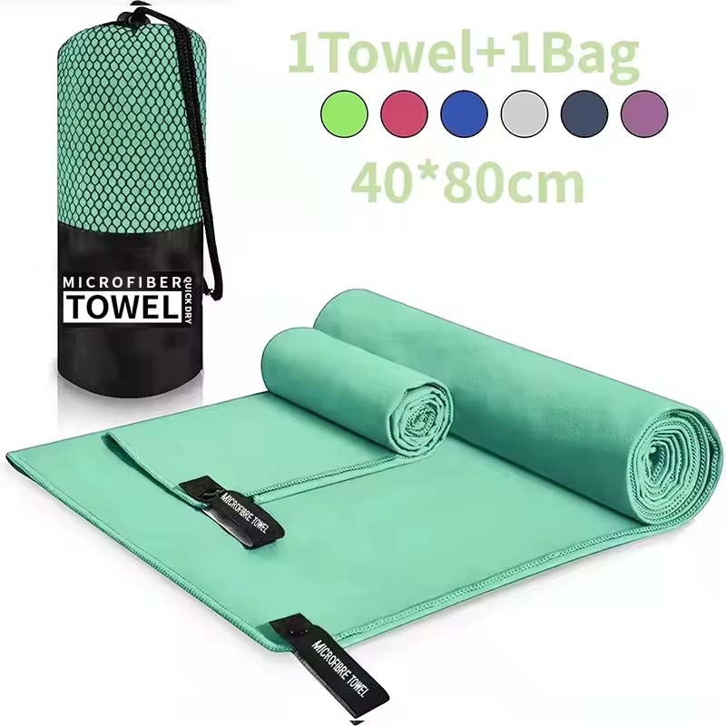 Green microfiber towel with carry bag
