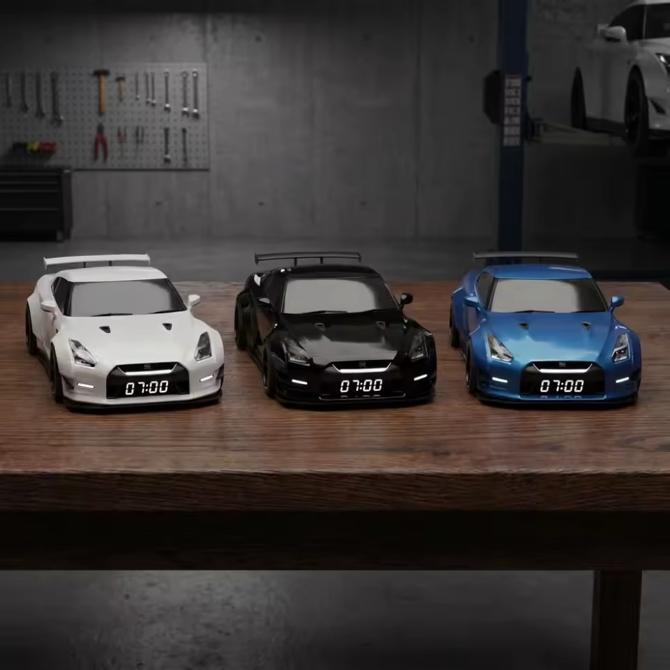 White black and blue sports car alarm clocks displayed together